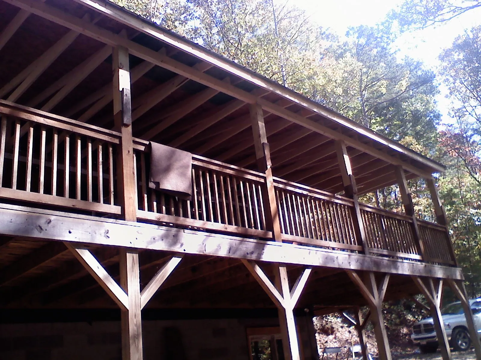 Timber framing under a new elevated porch and deck — Roof Leak Repair in West Sacramento by Roofing Brothers